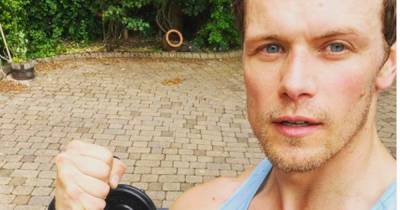 Outlander's Sam Heughan showed off his bulging arm muscles as he worked out for the weekend - www.dailyrecord.co.uk - Scotland
