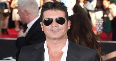 Simon Cowell says he believes he can persuade One Direction to reunite - www.ok.co.uk