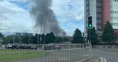 Fire crews battling huge blaze at Glasgow recycling centre as smoke seen across city - www.dailyrecord.co.uk - Scotland