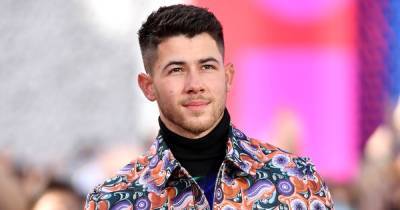 Nick Jonas Surprises Fan Wearing a Jonas Brothers Shirt on Street - www.usmagazine.com