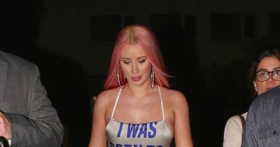 Iggy Azalea tells fans to 'leave her alone' after accusations she didn't support Britney Spears - www.msn.com