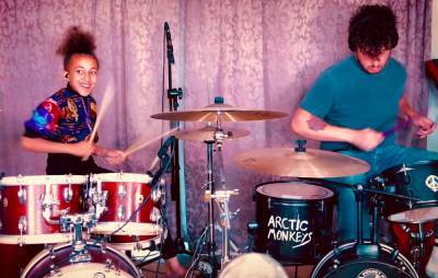 Watch Matt Helders and Nandi Bushell rip through Arctic Monkeys’ ‘Brianstorm’ on drums - www.nme.com