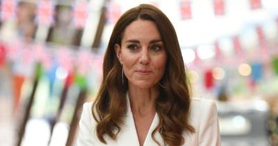 Kate Middleton ditches trademark bouncy blow dry for ultra-long and trendy waves - www.ok.co.uk - Germany