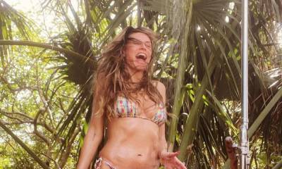 Heidi Klum cools off in her bikini and proves she is having a hot girl summer - us.hola.com
