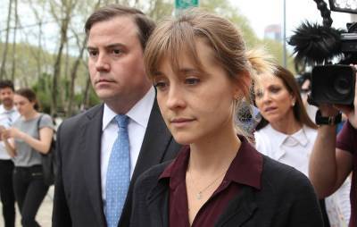 ‘Smallville’ actor Allison Mack jailed for three years for role in NXIVM cult - www.nme.com