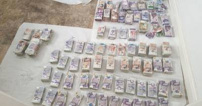 Suitcase with 'substantial amount of cash' found in cannabis raid - www.dailyrecord.co.uk