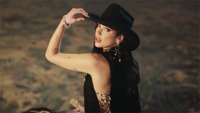Dua Lipa Rides A Mechanical Bull In Daisy Dukes Bikini Top In Wild West Themed ‘Love Again’ Video - hollywoodlife.com - Britain