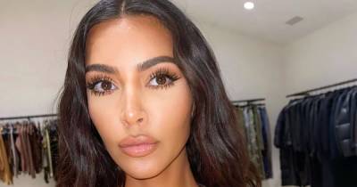Kim Kardashian Receives Backlash for Cultural Appropriation After Wearing Hindu ‘Om’ Earrings - www.usmagazine.com