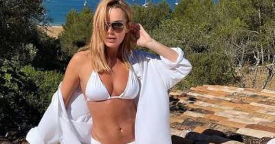 Amanda Holden enjoys sunshine getaway in Portugal with her look-alike daughters - www.manchestereveningnews.co.uk - Britain - Portugal