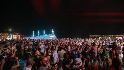 Music fans flock to Albania’s beach festival despite virus - abcnews.go.com - Spain - Albania