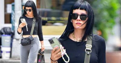 Lily Allen flashes her midriff as she checks her phone - www.msn.com - New York
