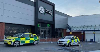BREAKING: Two arrested after man stabbed outside gym on Salford retail park - www.manchestereveningnews.co.uk