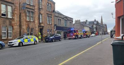Firefighters race to Perth flats where man’s body was discovered as police continue probe - www.dailyrecord.co.uk - Scotland