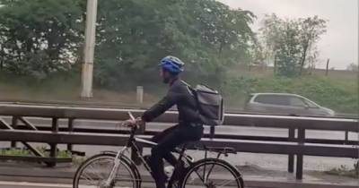 Deliveroo cyclist flies down Glasgow M8 after sat nav 'took him on wrong road' - www.dailyrecord.co.uk