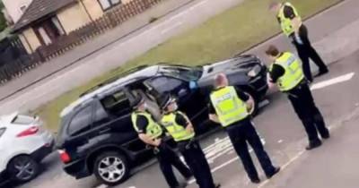 Police in car chase with BMW X5 through Glasgow streets as occupants flee scene and man arrested - www.dailyrecord.co.uk