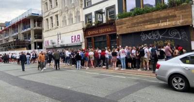 Huge queues build as crowds descend on city centre pubs ahead of historic Euro 2020 final - www.manchestereveningnews.co.uk - Italy - Manchester