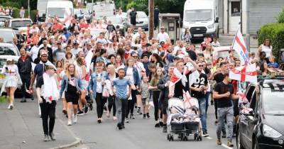 Hundreds of football fans 'march for England' through north Manchester ahead of historic Euro 2020 final - www.manchestereveningnews.co.uk - Italy - Manchester