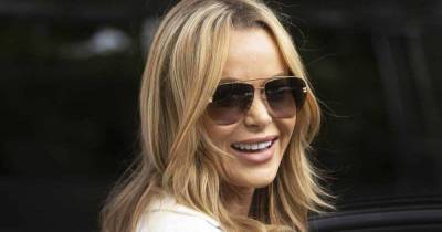 Amanda Holden stuns in nothing but an England shirt – and looks incredible - www.msn.com - Italy