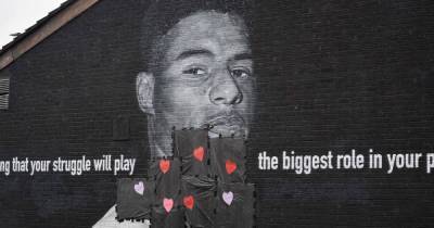 Love in the face of hate: Mancunians leave hearts and messages on Rashford mural after it's defaced by racist - www.manchestereveningnews.co.uk - Italy - county Love