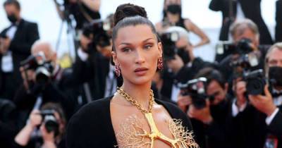 Bella Hadid wears giant golden lung necklace with couture dress at Cannes - www.msn.com - USA