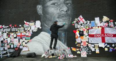 "Not in our city": Emotional restoration of Marcus Rashford's mural begins with player on 'verge of tears' following outpouring of love and support - www.manchestereveningnews.co.uk - Manchester - Sancho
