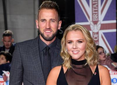 PICS: Harry Kane receives a hero’s welcome as wife Kate blasts racist remarks against players - evoke.ie - Italy - Manchester