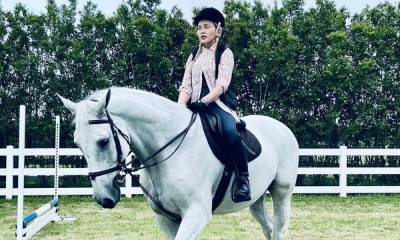 Madonna rides a horse while relaxing on the ranch with her kids - us.hola.com