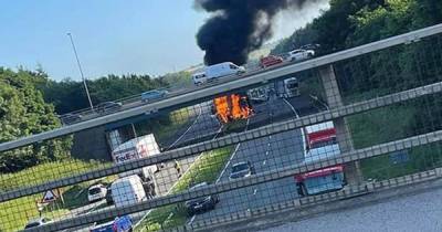 Lorry erupts into flames in huge motorway crash as police confirm victims - www.dailyrecord.co.uk