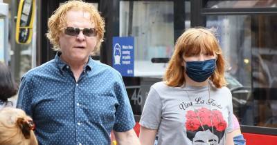 Simply Red's Mick Hucknall snapped with rarely-seen daughter Romy - www.ok.co.uk