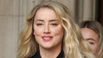 Amber Heard Shares Adorable New Pic of 'Boss' Baby Oonagh - www.etonline.com