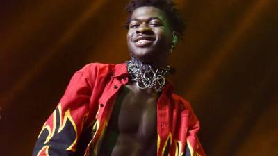 Lil Nas X Takes Himself to Court Over 'Satan Shoes' in Cinematic Teaser for New Song 'Industry Baby' - www.etonline.com
