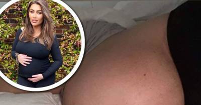 Lauren Goodger insists her baby will arrive in a 'few weeks' - www.msn.com