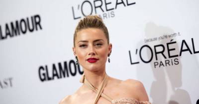 Amber Heard quietly welcomes baby girl Oonagh Paige via surrogate - www.msn.com