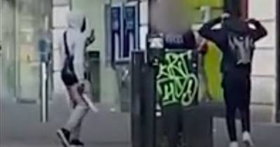 Shocking moment gang armed with machetes and knives threaten boy in Glasgow street fight - www.dailyrecord.co.uk - Britain