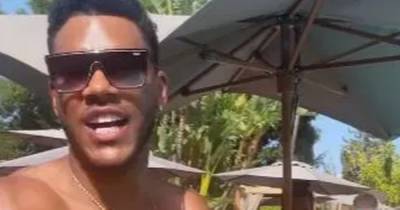 Love Island's Theo Campbell pops champagne bottle after being blinded in one eye by cork - www.ok.co.uk