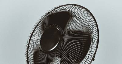How much it costs to keep an electric fan on all night as UK sizzles in heatwave - www.manchestereveningnews.co.uk - Britain