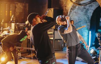 IDLES and Slowthai team up for intense new version of ‘Model Village’ - www.nme.com - county Talbot
