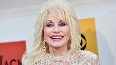 Dolly Parton recreates iconic Playboy cover shoot for husband's birthday: 'He still thinks I'm a hot chick' - www.foxnews.com