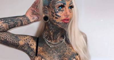 Tattoo model savagely branded 'ugly scum' after covering 98% of body in art - www.dailyrecord.co.uk - Australia