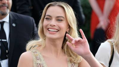 Margot Robbie Admits She Slept Next to a Cardboard Cut-Out of THIS Celebrity for 2 Years - www.etonline.com