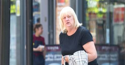 Grandmother, 56, stole high-end mobile phones worth £24,000 - she says she was forced to do it by "a faceless individual operating in the shadows" - www.manchestereveningnews.co.uk - Manchester