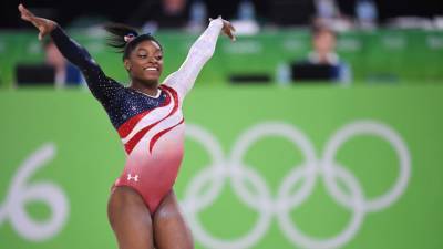 Simone Biles’ Is the World’s Most Decorated Gymnast— Her Net Worth Is Just as Impressive - stylecaster.com