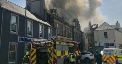 Emergency services rush to scene of huge blaze in Scots town as thick smoke fills air - www.dailyrecord.co.uk - Scotland