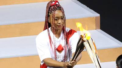 Naomi Osaka Lights the Olympic Cauldron at the 2021 Opening Ceremony - www.glamour.com