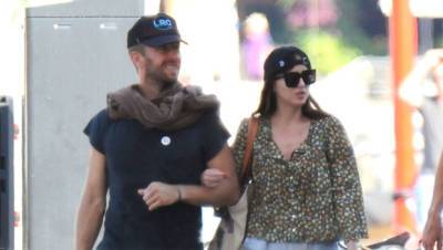 Dakota Johnson Chris Martin Link Arms As They Stroll Around Mallorca On Romantic Getaway — Photos - hollywoodlife.com - Spain