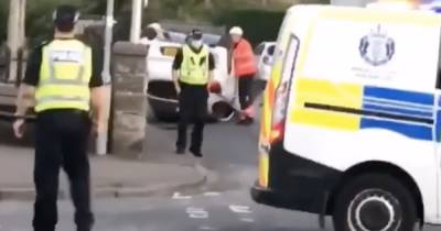 Car flips onto roof after horror two vehicle crash in Scots village - www.dailyrecord.co.uk - Scotland