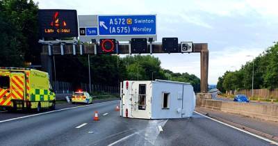 Drink driving arrest as campervan overturns on M60 causing traffic chaos - www.manchestereveningnews.co.uk
