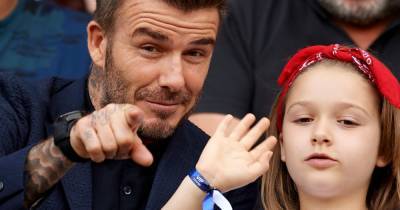 Doting dad David Beckham sweetly kisses Harper at football match with his kids - www.ok.co.uk - county Union