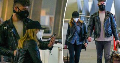 Dannii Minogue and her boyfriend Adrian Newman fly back to Melbourne - www.msn.com - city Melbourne