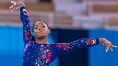 Simone Biles Says She Feels the 'Weight of the World' Ahead of Gymnastics Team Finals at Tokyo Olympics - www.etonline.com - USA - Tokyo